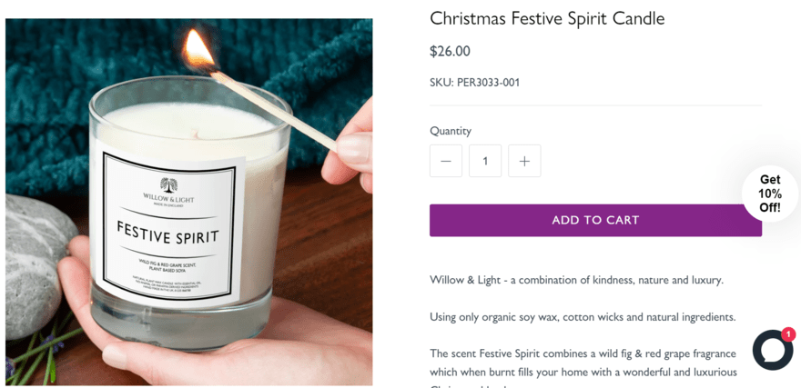 Festive Spirit candle being lit in product photo on TreatRepublic.com